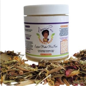 Organic Infused Herbal Hair Food jar, 4 fl oz plant-based hair treatment surrounded by dried herbs and botanicals. Plant-based, paraben-free, gluten-free, cruelty-free hair care product with natural ingredients including olive oil, jojoba oil and herbs for hair growth and health.