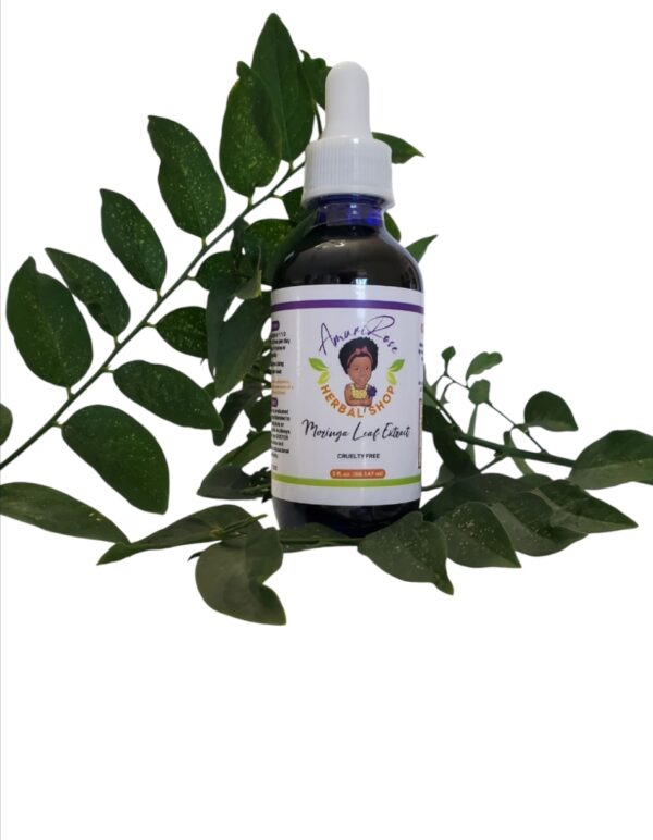 Organic Moringa Leaf herbal tincture in blue glass dropper bottle with natural wellness supplement, 2oz liquid extract for holistic health